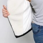 Veste En Mouton Noir : élevez Votre Style Biker Avec Luxe Et Audace!
